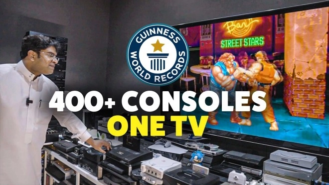 Truc de OUF, il relie 444 consoles de jeux � un m�me t�l�viseur, record du monde !!!